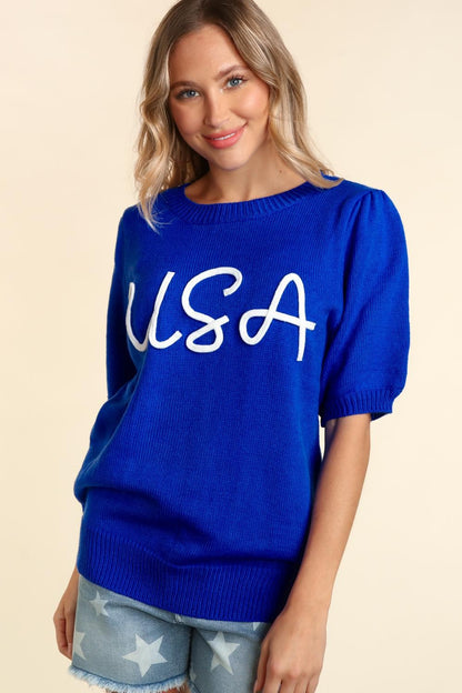 Pop up letter, USA top. Blue with white USA embroidered short sleeves comes in small medium and large.