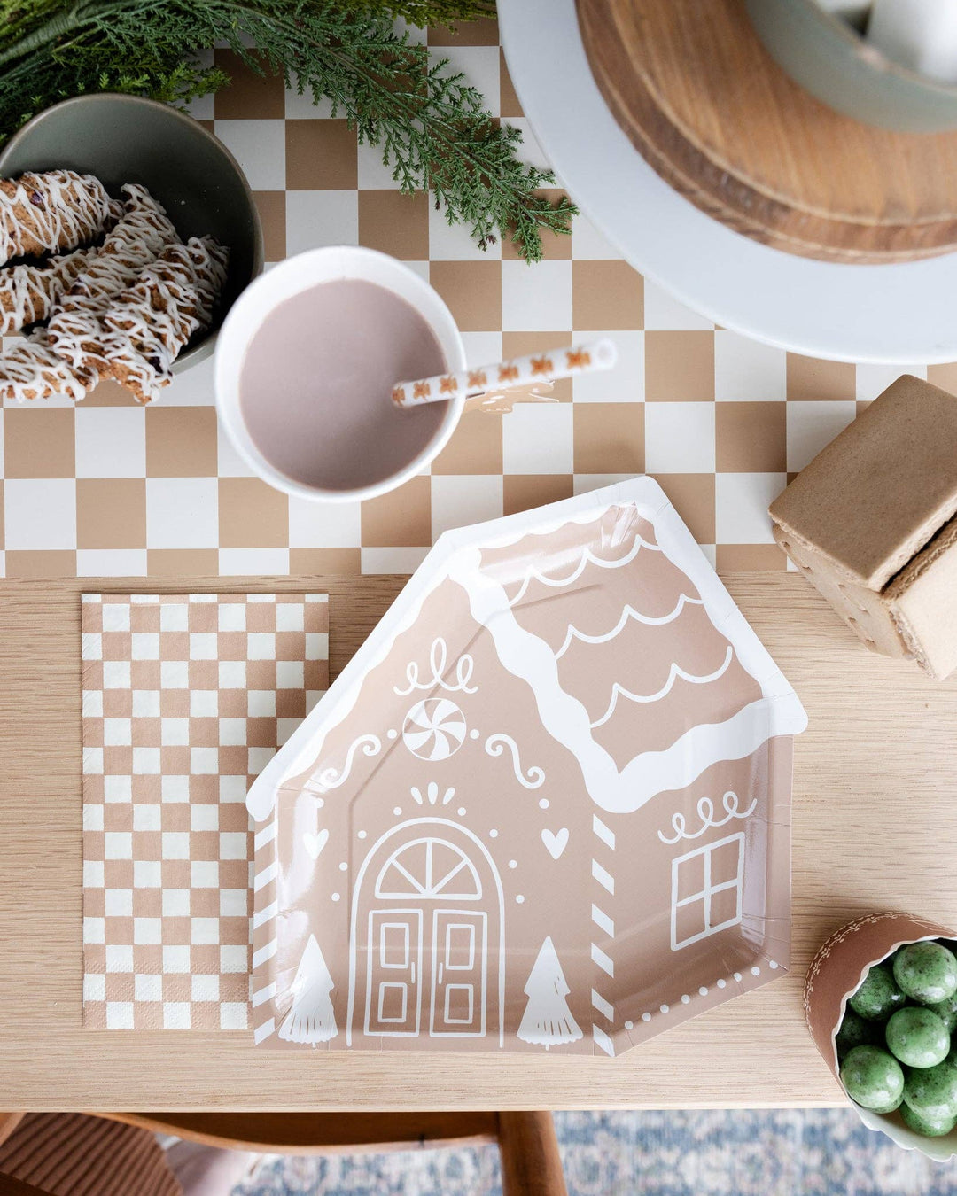 Gingerbread House 9″ plate with white icing illustrations.