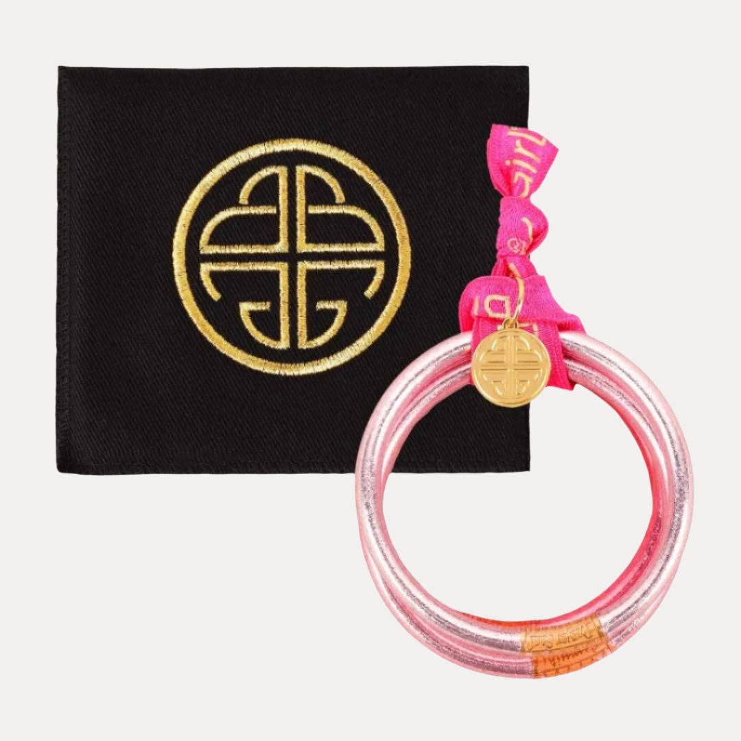 Set of 4 medium pink bangles with gold charm and pink ribbon. Available in medium size.