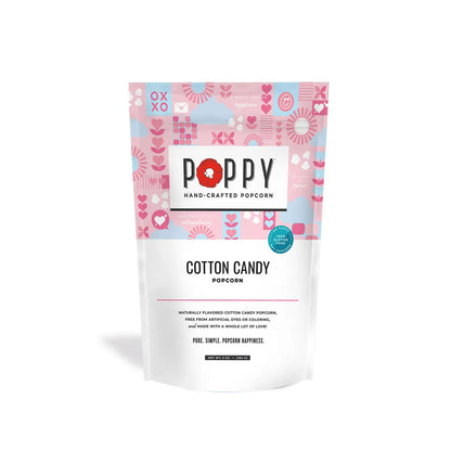 Valentine's Day Cotton Candy Poppy Popcorn features pink popcorn in naturally colored pink, blue, and white packaging with a clear bottom window. Sizes available: Standard bag size.