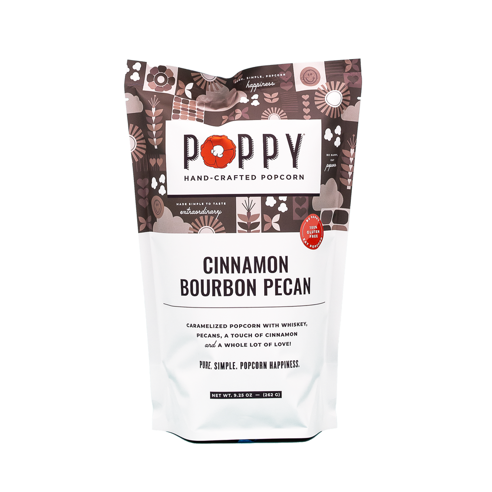 Gluten-free Cinnamon Bourbon Pecan Popcorn in a patterned bag; sizes available: 4oz, 8oz.