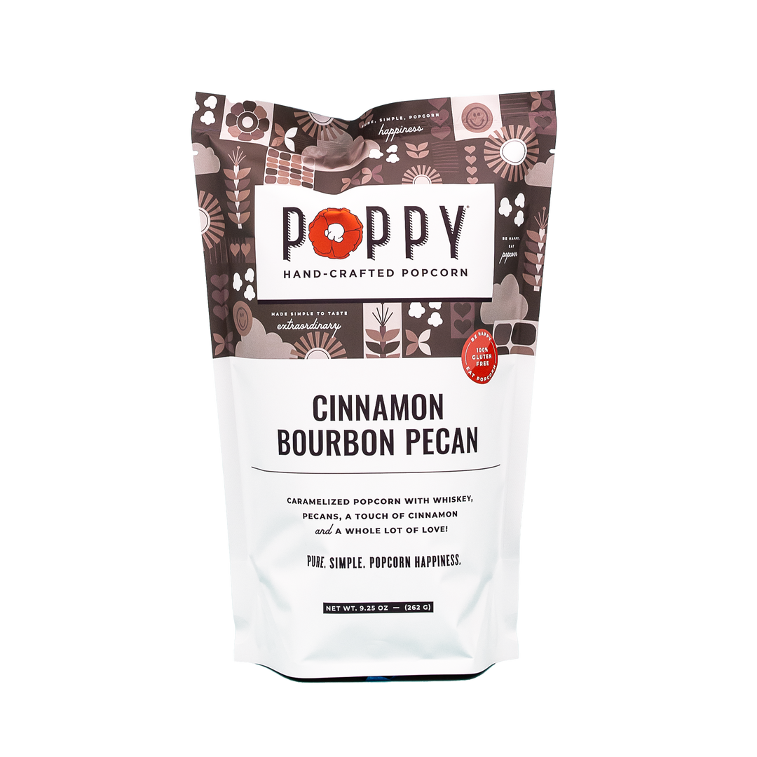 Gluten-free Cinnamon Bourbon Pecan Popcorn in a patterned bag; sizes available: 4oz, 8oz.