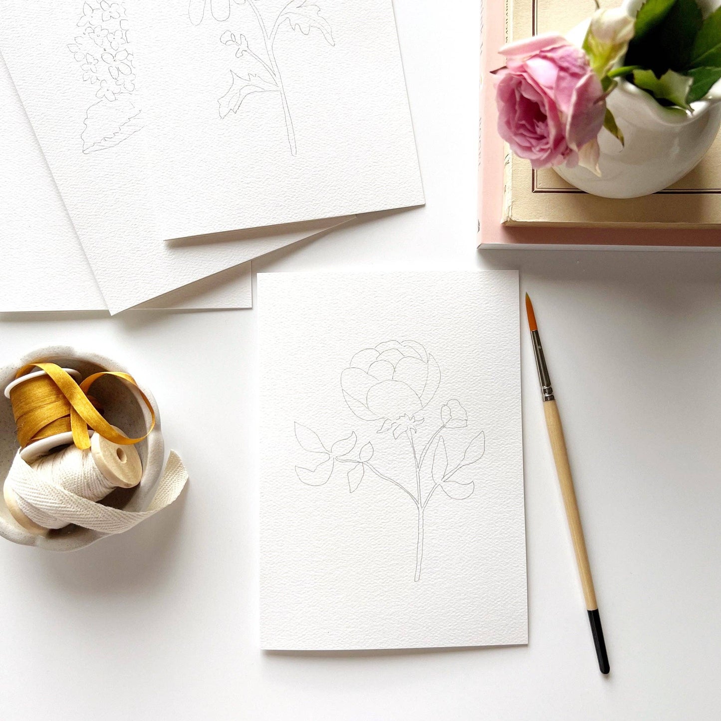 Garden Flowers Paintable Notecards Set of 8 with pencil sketch flower design on textured white paper; standard notecard size.