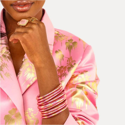 KOI Rose All Weather Bangles® Set of 4 in pink and gold, available in small, medium, large, and extra-large.
