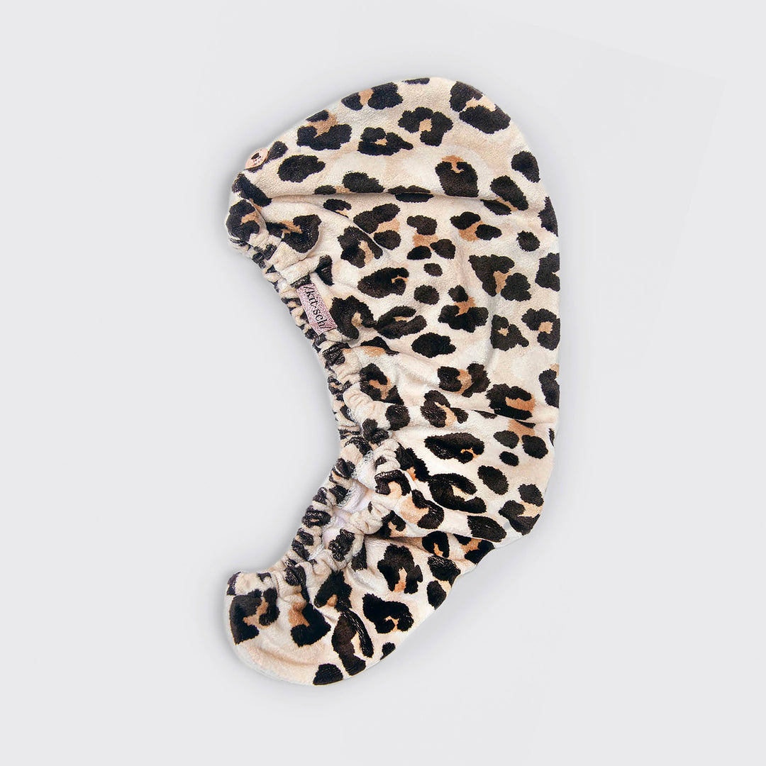 Microfiber leopard print hair towel with elastic edge for fast drying and frizz control. Available in standard and large sizes.