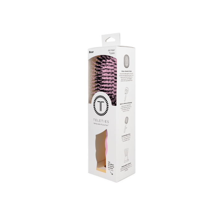 Bubblegum pink boar bristle hair brush.