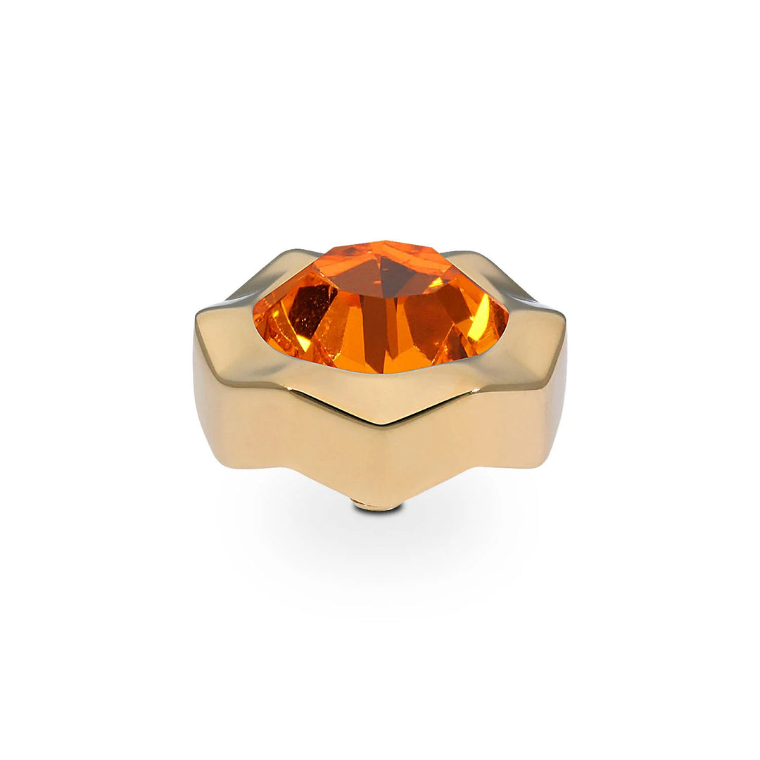 Gold star-shaped ring with large faceted orange gemstone, customizable interchangeable tops. Sizes available: various.