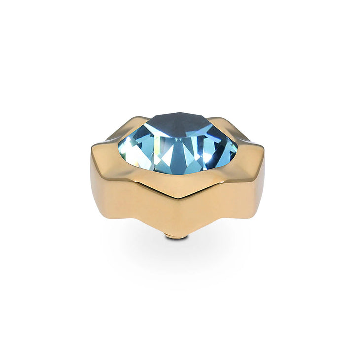 Gold star-shaped ring with a large faceted blue gemstone center, handmade in Germany. Available in sizes 6-9.