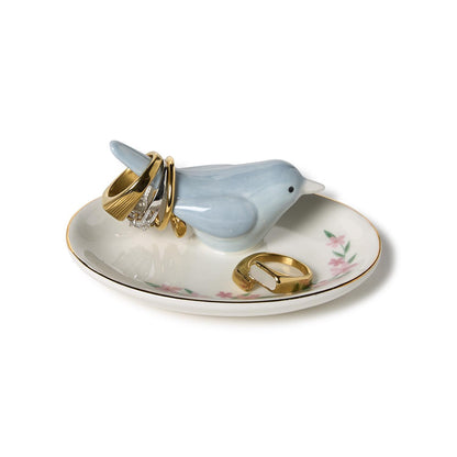 Blue Bird Ceramic Ring Holder: pale blue bird, gold rim, pink floral on white base; holds rings. Size: 4" diameter.