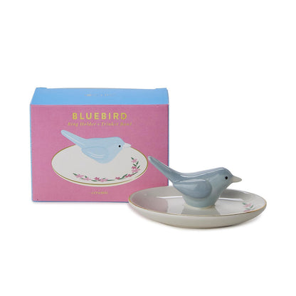 Blue Bird Ceramic Ring Holder on a floral-painted dish. Available in small, medium, and large sizes.
