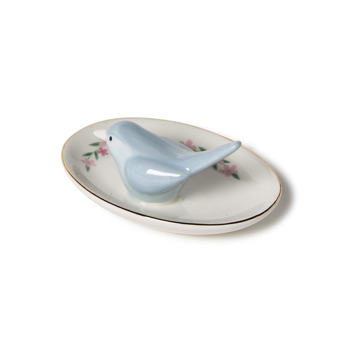 Small oval ceramic ring holder with blue bird figurine, floral design, gold rim. Available in one size.