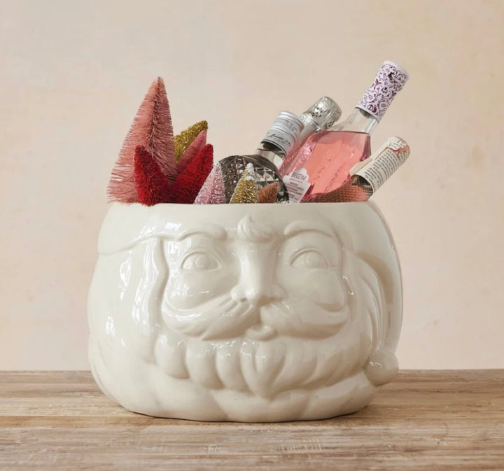 Cream-colored stoneware Santa head bottle cooler.