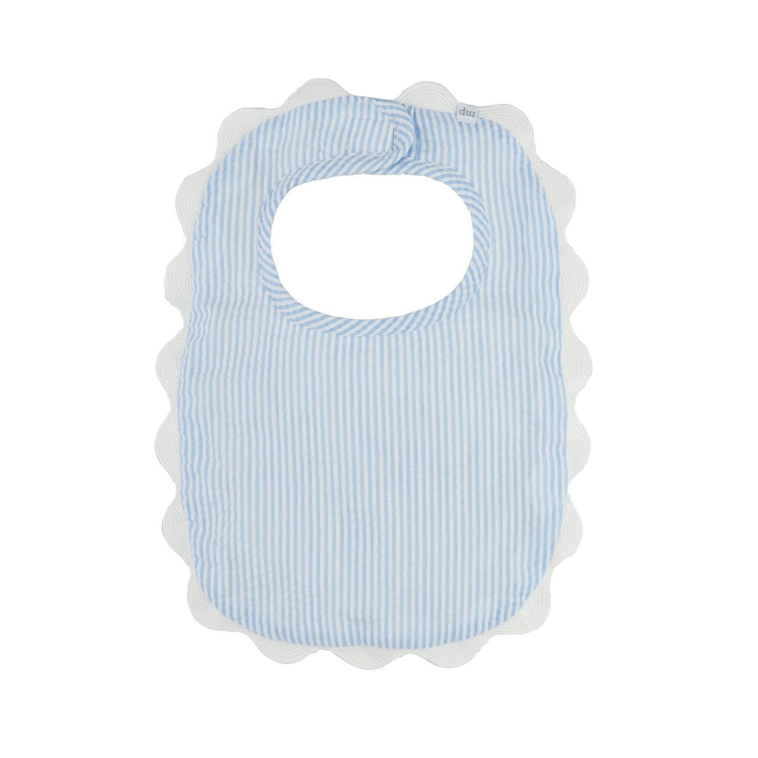 Light blue and white seersucker bib with scalloped white trim, rounded neckline. Available in sizes S, M, L.