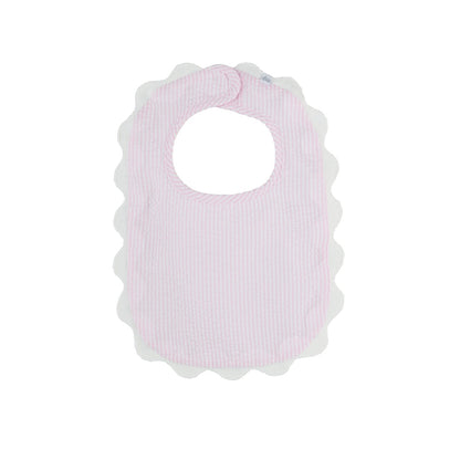 Scallop Trim Bib with pink and white seersucker stripes, scalloped white edge, rounded neckline. Available in one size.