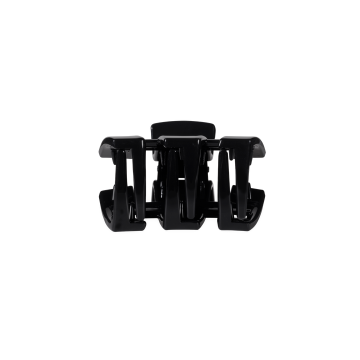 The Classic | Jet Black | Petite | Claw Clip is a durable plastic hair accessory with a no-slip design, available in petite size.