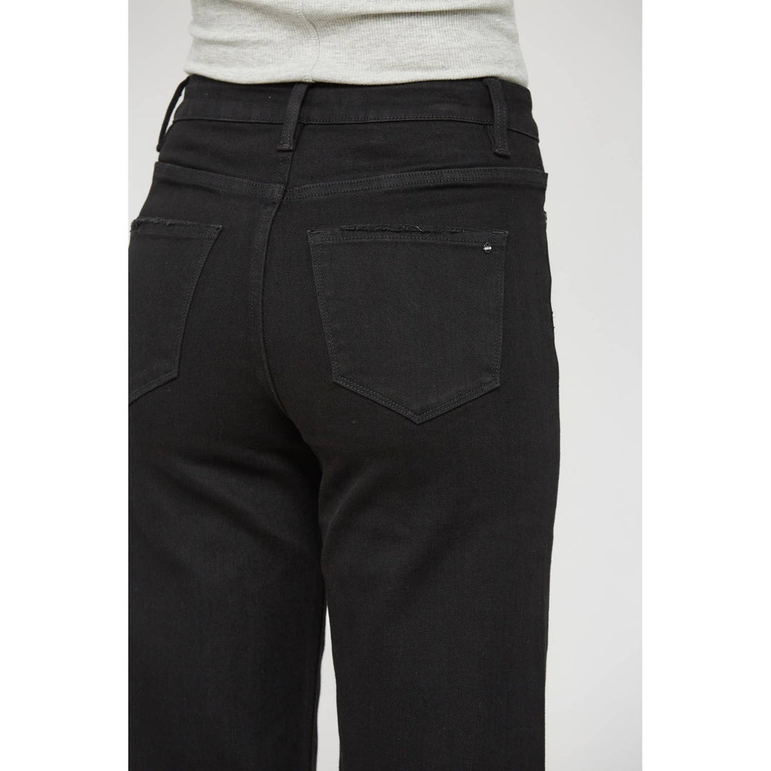 Wide leg cropped black denim jeans with back pockets and frayed waist hem, size 29.