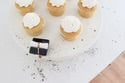 Top of The Class Minis: six cupcakes with white frosting. Available sizes: box of 6 minis. Perfect for graduation parties.
