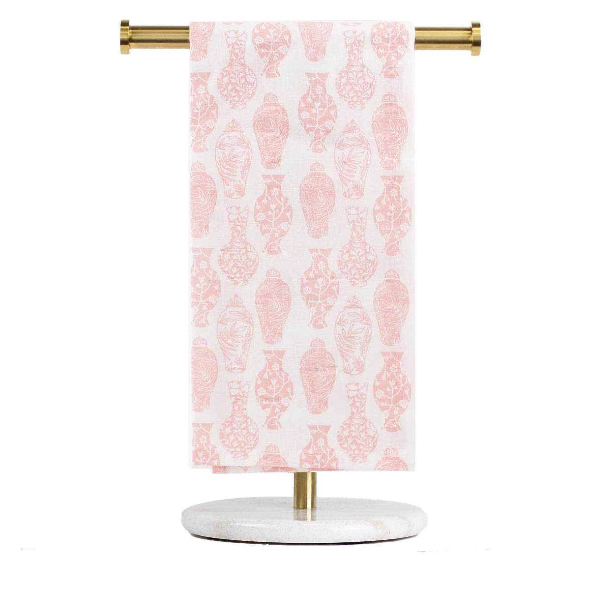 The Claire Chinoiserie Hand Towel features a pink vase pattern. Available in standard hand towel size.