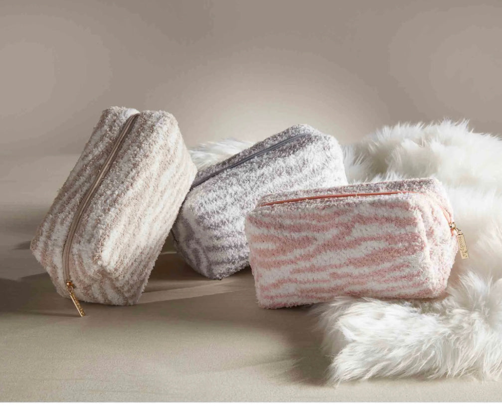 This product includes three plush Chenille Cases in soft pink and gray tones. They are available in one standard size.