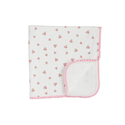 White cotton blanket with pink roses, pink ruffle edge, folded corner. Available in 30"x40" and 36"x48" sizes.