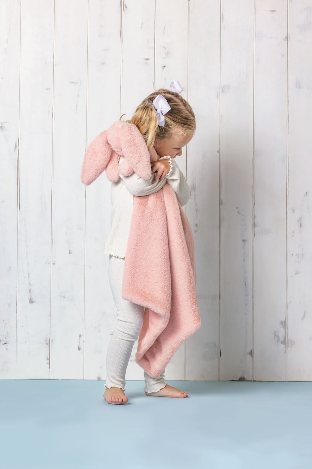 Pink Cuddle Plush Blanket shown; available in sizes S, M, and L.
