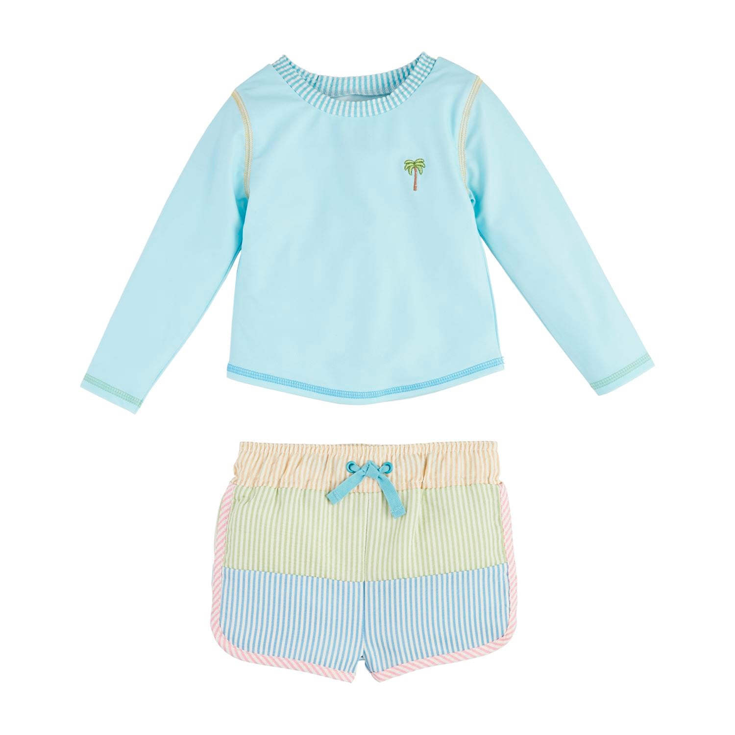 The Seersucker Rash Guard & Swim Trunks Set includes: - Light blue rash guard with palm tree design - Striped swim trunks in pastel yellow, green, and blue - Tie waistband Available Sizes: 2T, 3T, 4T, 5T.