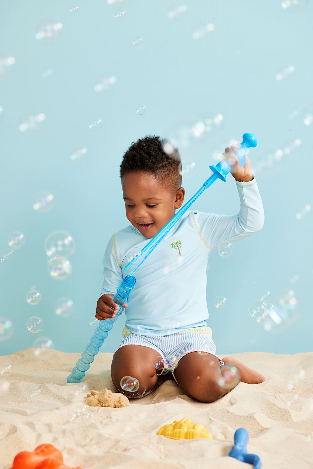Seersucker Rash Guard & Swim Trunks Set for young children. Sizes available: 2T, 3T, 4T, 5T.