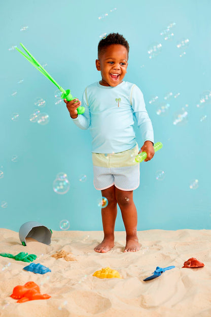 Seersucker Rash Guard & Swim Trunks Set: A playful swim set for kids featuring a coordinating rash guard and swim trunks. Sizes available: 2T, 3T, 4T, 5T, 6, 7.