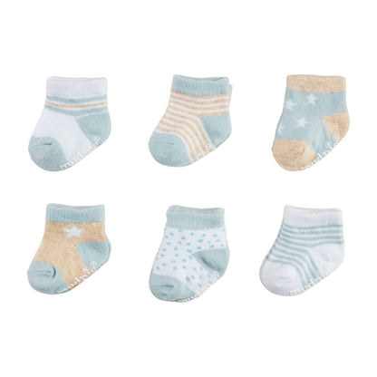 Six pairs of baby socks, 0-6 months, in pastel blue, white, and beige with stripes, stars, and polka dots.