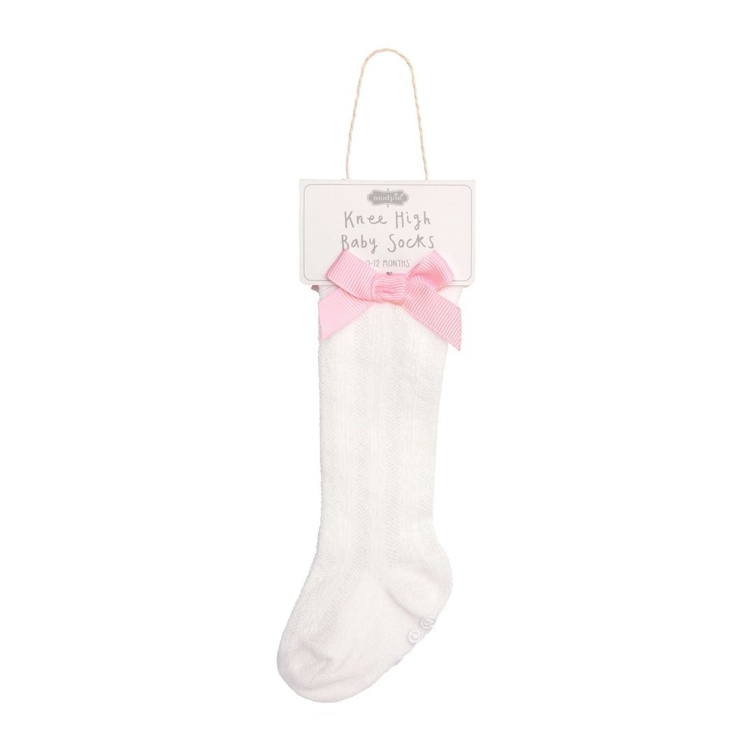 White Pointelle Bow Knee Sock, cotton, knee-high. Size: 12-18 months. Pink bow detail attached.