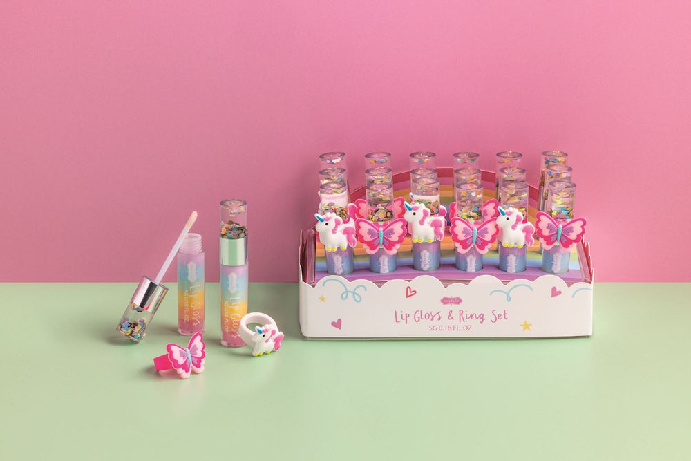 Display box of glitter-topped, colorful lip gloss tubes with unicorn and butterfly rings. Sizes available: standard only.