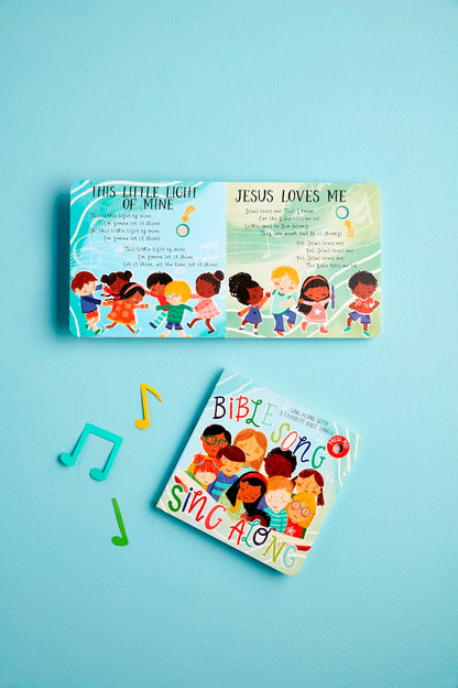 The "Bible Song Book" is a sing-along book featuring children singing popular Sunday School songs. It includes lyrics for "This Little Light of Mine" and "Jesus Loves Me," accompanied by colorful musical notes. Sizes available: Not specified.