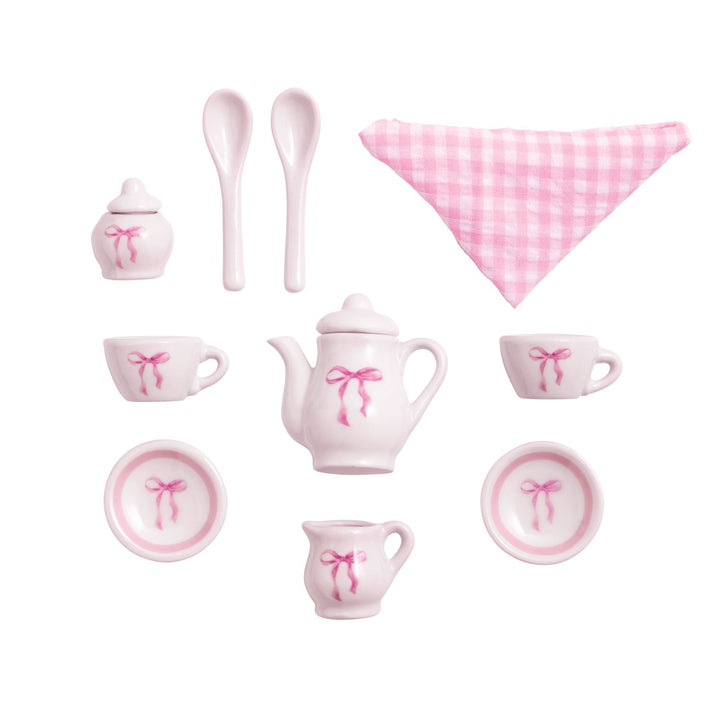 Mini Bow Tea Set: white ceramic with pink bows, includes teapot, creamer, sugar bowl, cups, saucers, spoons. Child size.
