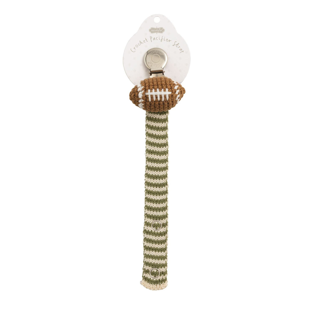 Crochet Pacy Clip with brown football design and green-white striped strap; available in 12 styles.
