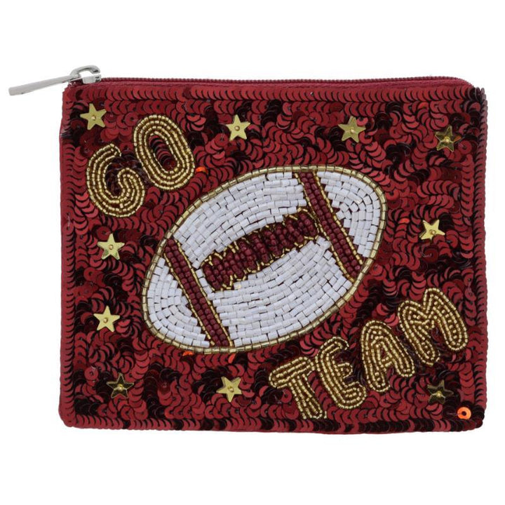 **Product:** Game Day Sequin Coin Purse

**Description:** Small red coin purse adorned with sequins and beads. Features a beaded football design, "GO TEAM" in gold beads, and gold star embellishments. Background covered in red and black sequins.

**Sizes Available:** One Size