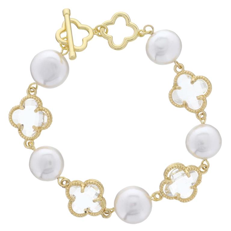 This bracelet features large coin pearls alternated with golden, clover-shaped links that hold smaller, translucent gems. Its design is complete with a secure toggle clasp. The product is gold-plated and is available in one size that fits all.