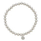 18K white gold plated bracelet with large ball beads and small engraved charm. Available in 7", 7.5", and 8" sizes.