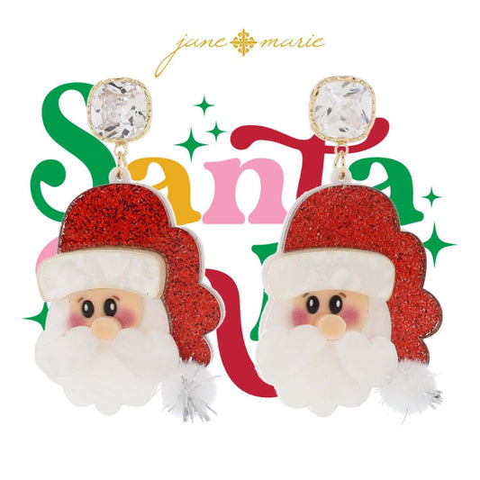 Santa face earrings made from red glitter and pearlescent resin with a crystal post and pom. Available sizes: Not specified.