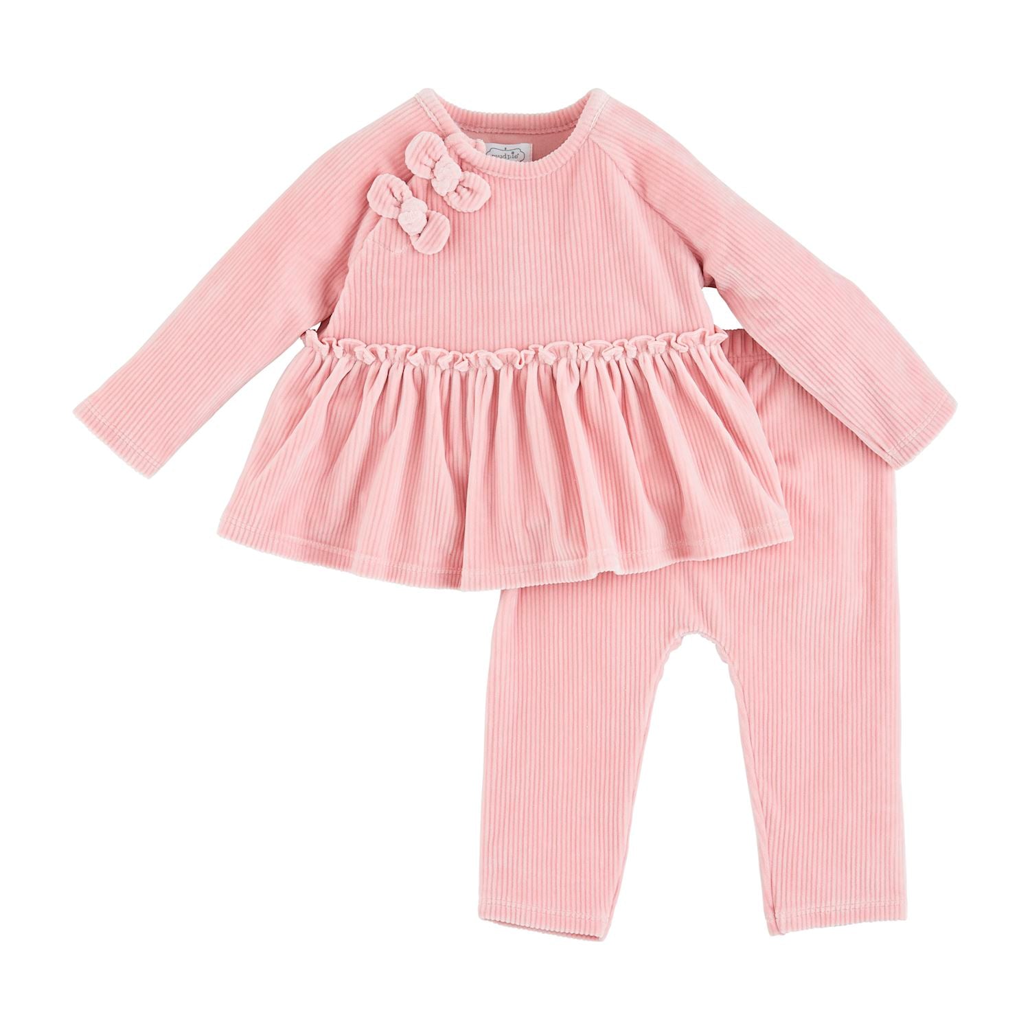 The Baby Velour Pant Set is a pink corduroy 2-piece outfit with a ruffled, long-sleeve top featuring two bow accents and matching pants. Sizes available: 0-3M, 3-6M, 6-9M, 9-12M.