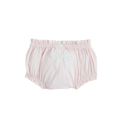 Light pink Bow Diaper Cover with white textured bow and ruffled leg openings. Available in sizes NB, 0-3M, 3-6M, 6-12M.