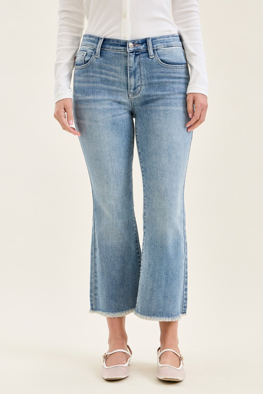 Judy Blue MR Kick Flare Jeans with frayed hem, ultra-stretchy denim. Sizes: 0-20.