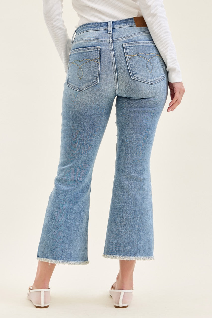 Judy Blue MR Kick Flare Jeans w/ Frayed Hem, light blue, available in sizes 24-32.