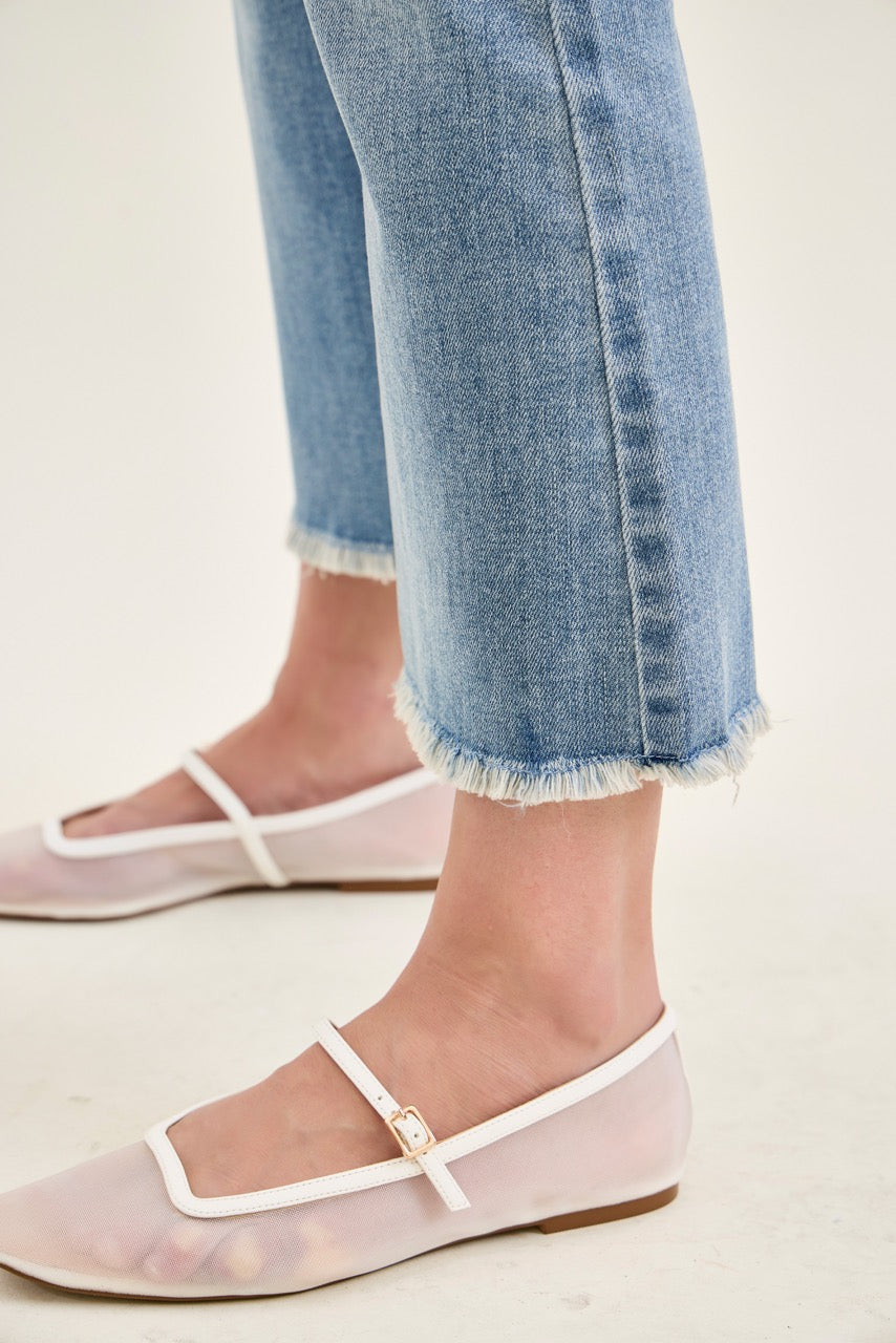 Judy Blue MR Kick Flare Jeans with frayed hem, light blue. Available in sizes 24-32.