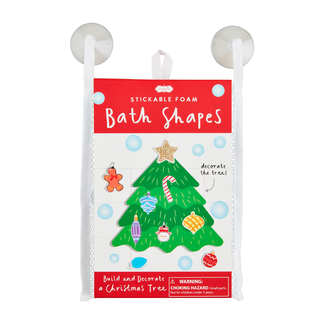 Christmas Bath Stickable Sets with green tree-shaped bath foam and decorative pieces in a hanging mesh bag.