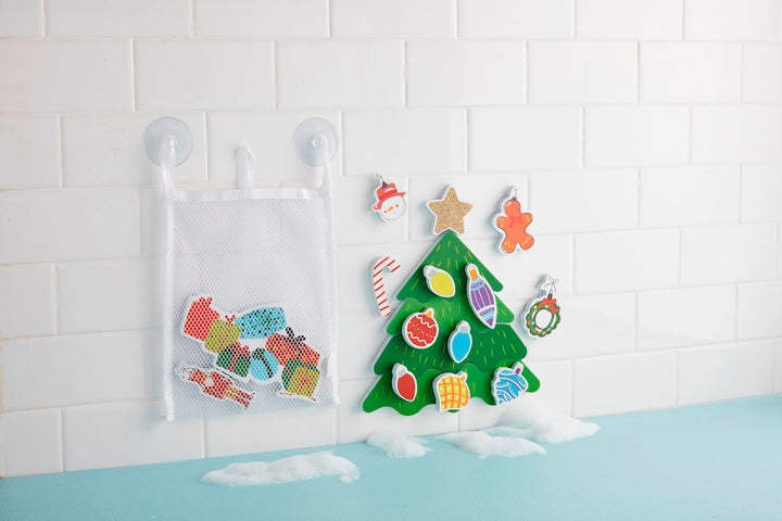 Christmas Bath Stickable Sets with foam Christmas tree and holiday-themed bath foam shapes in a white mesh storage bag.