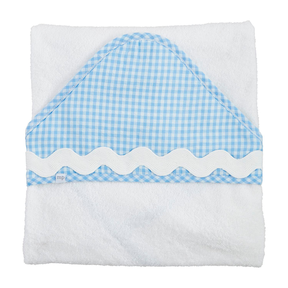 The Baby Hooded Towel is made from soft cotton with a blue and white gingham hood and a white wavy trim. Available in one size.