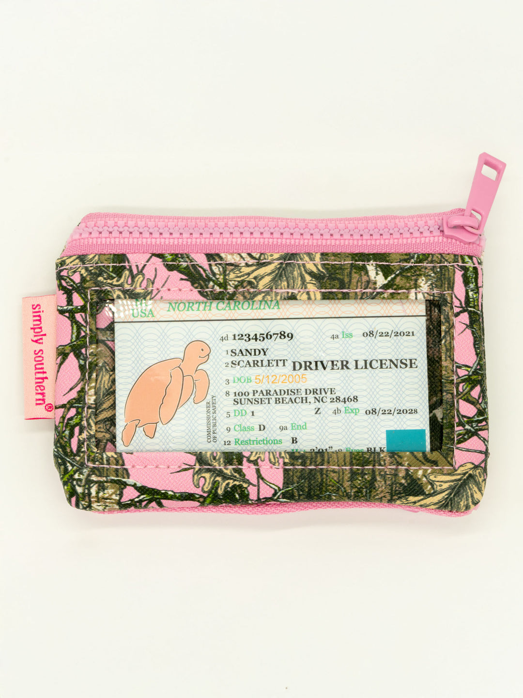 Key Chain Wallet with zippered pockets, pink accents, camo design, clear window, keyring, "simply southern" tag. Sizes: N/A.
