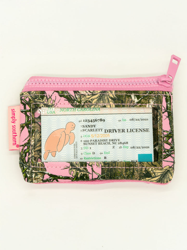 Key Chain Wallet with zippered pockets, pink accents, camo design, clear window, keyring, "simply southern" tag. Sizes: N/A.