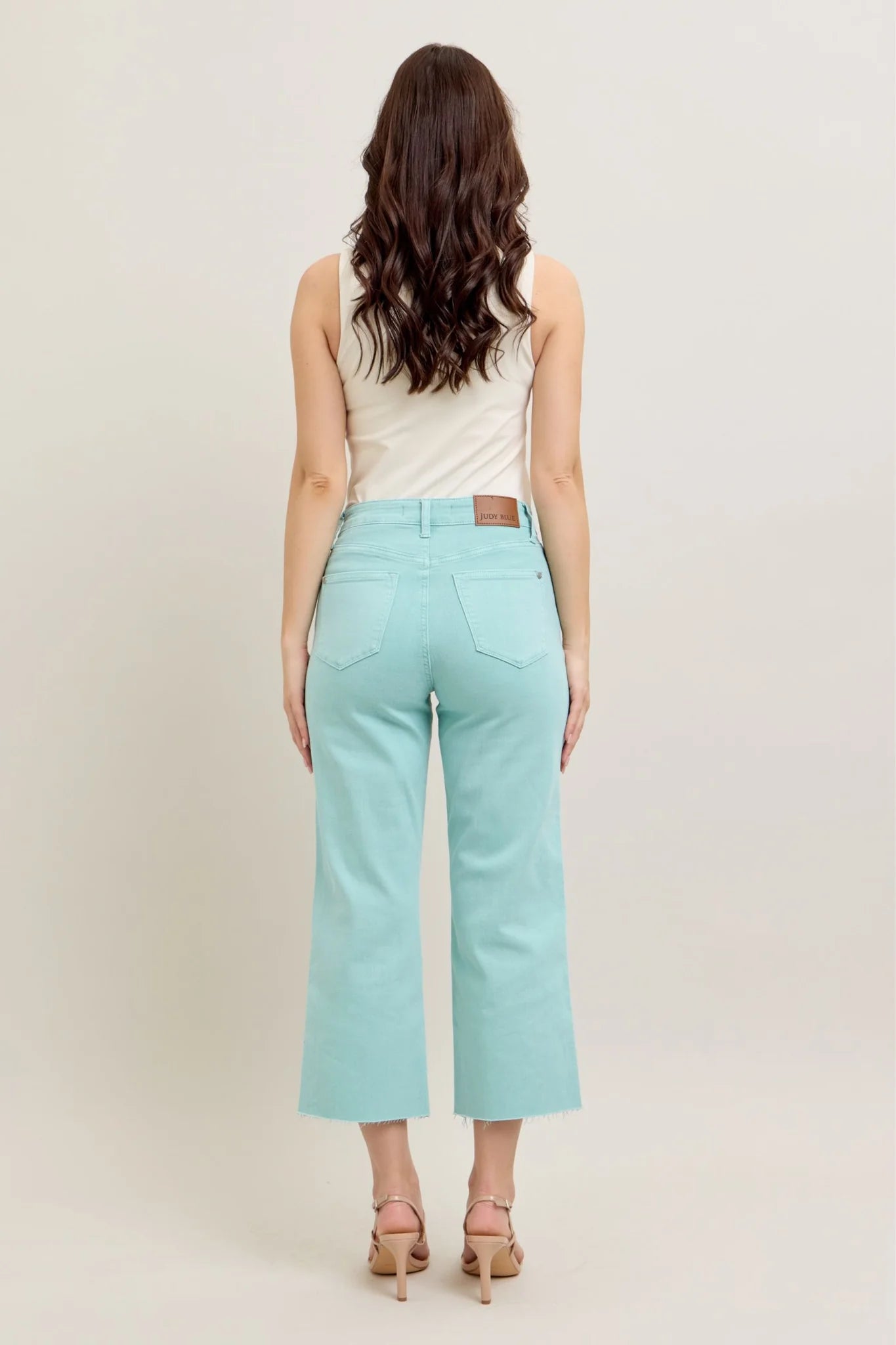 Judy Blue HW Garment Dyed Light Sky Blue Crop Wide Jeans: High-waisted, light sky blue dyed, wide-leg crop jeans with a flattering fit. Available sizes: 24-32.