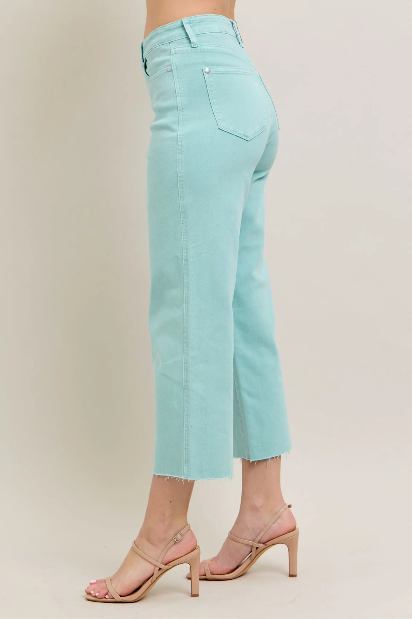Judy Blue HW Garment Dyed Light Sky Blue Crop Wide Jeans feature frayed hems. Available in sizes 0-24W.